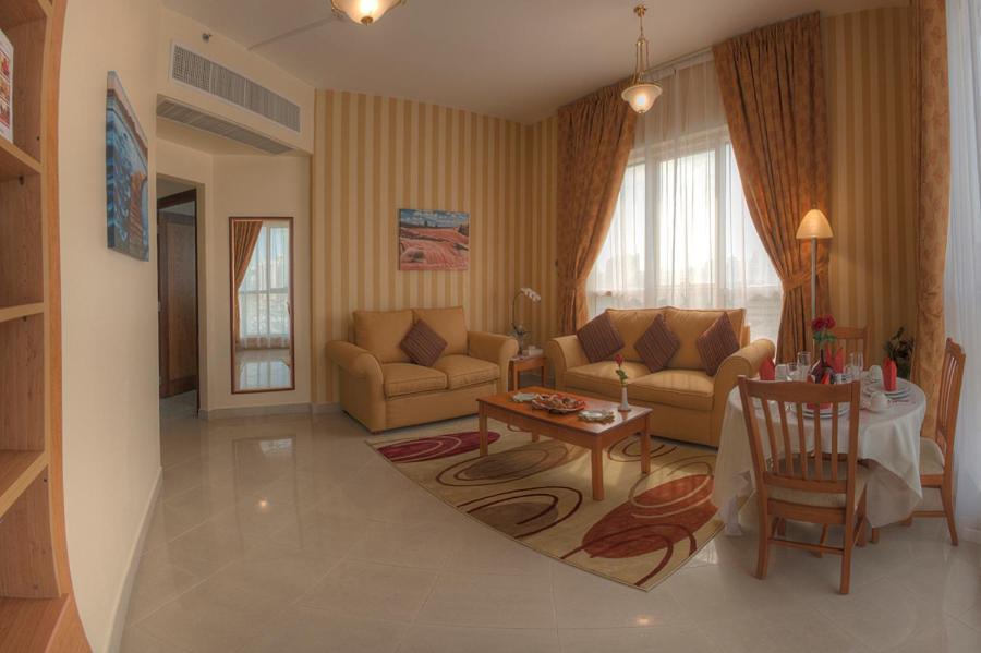 אבו דאבי Murjan Asfar Hotel Apartments חדר תמונה