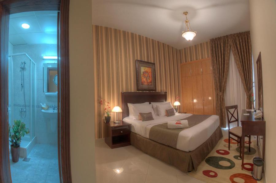 אבו דאבי Murjan Asfar Hotel Apartments חדר תמונה